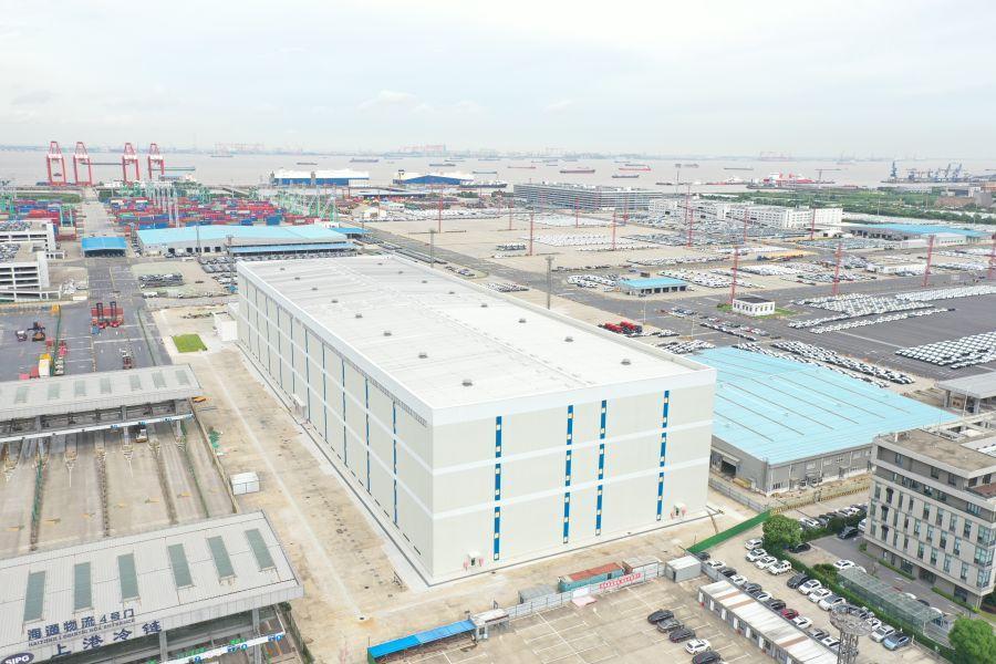 国内首个全自动货架式商品汽车中转仓库项目主体工程交工开云电竞验收(图2)